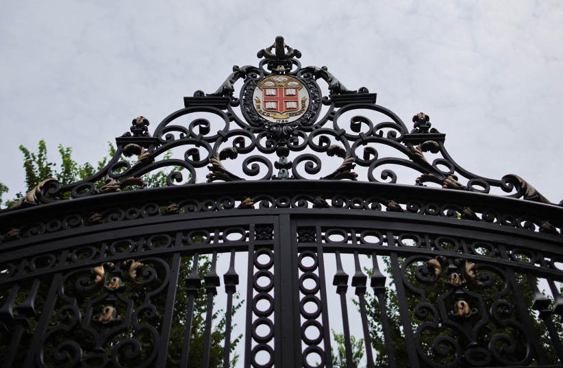  The seal of Brown University sits atop the Van Wickle Gates at the edge of the main campus in Providence, Rhode Island, U.S. (credit: REUTERS/BRIAN SNYDER)