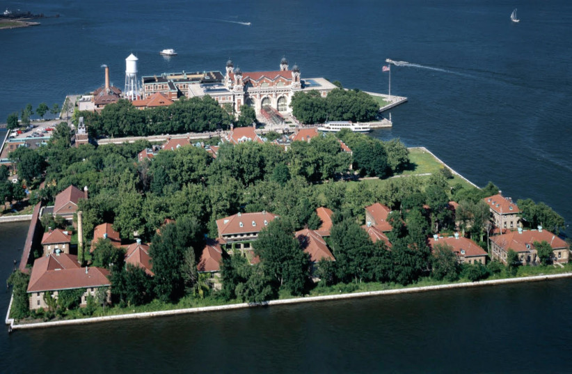  AERIAL VIEW of Ellis Island, which was inaugurated in 1892 and served as an immigration station until its 1954 closure. With millions of immigrants to pass through its doors over 60 years, some 40% of Americans can trace an ancestor back to the island. (credit: Wikimedia Commons)