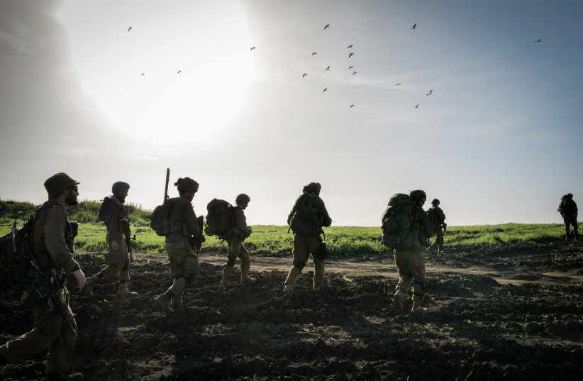  Amidst tension with Syria, IDF Reserve infantrymen take part in a military maneuver of their battalion in Golan Heights, on April 1, 2024.  (credit: MICHAEL GILADI/FLASH90)
