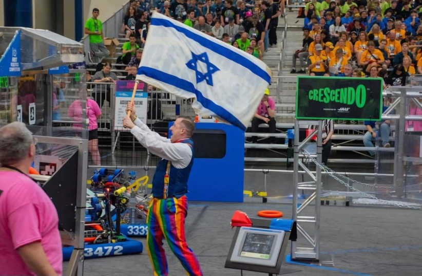 FRC MC in Houston competition waving the Israeli flag after the team from Binyamina won first place. Uploaded on 4/5/2024 (credit: FIRST ISRAEL)