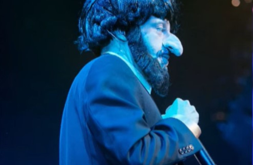 Macklemore dressed up as an offensive Jewish caricature in 2014. (credit: screenshot)