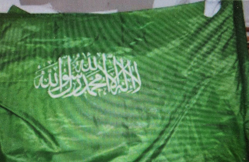  Police arrested an East Jerusalem resident in his 20s on suspicion of hanging Hamas flags in Isawyia. May 9, 2024. (credit: POLICE SPOKESPERSON'S UNIT)