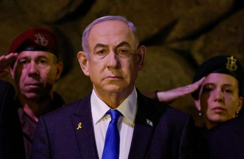  Israeli Prime Minister Benjamin Netanyahu attends a wreath-laying ceremony marking Holocaust Remembrance Day in the Hall of Remembrance at Yad Vashem, the World Holocaust Remembrance Centre, in Jerusalem, May 6, 2024.  (credit: REUTERS/Amir Cohen/Pool/File Photo)