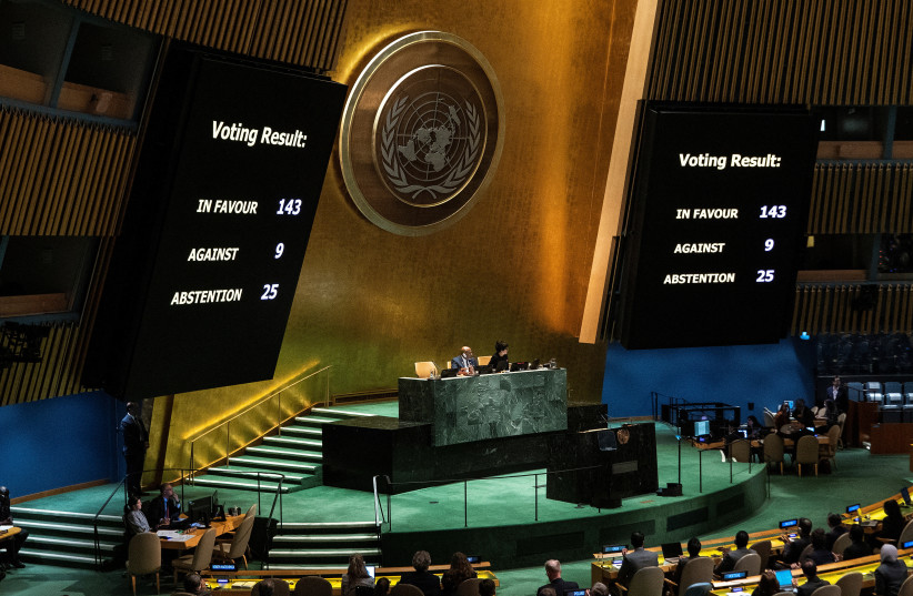  Screens show the voting result during the United Nations General Assembly vote on a draft resolution that would recognize the Palestinians as qualified to become a full U.N. member, in New York City, US May 10, 2024. (credit: Eduardo Munoz/Reuters)