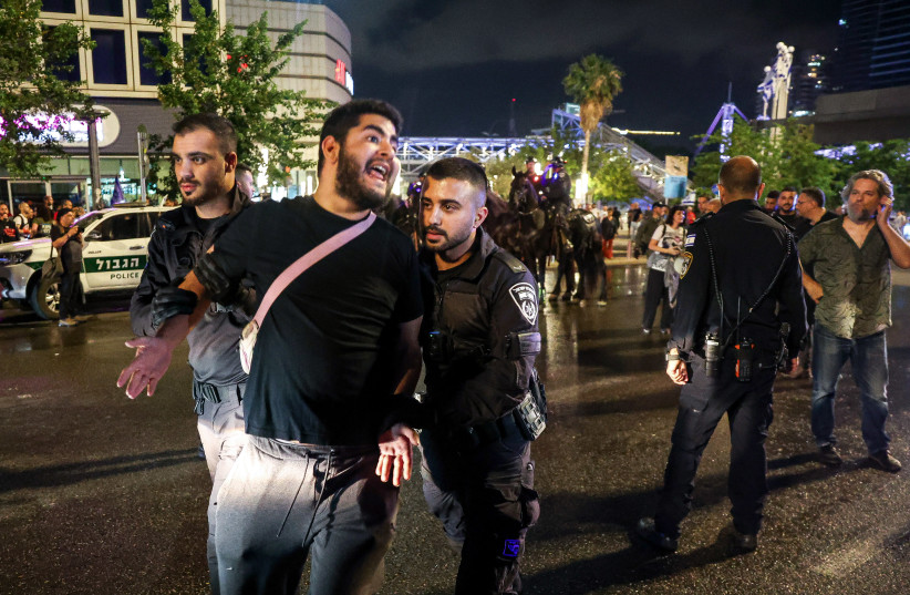  Demonstrators clash with police during a protest calling for the release of Israeli hostages held in the Gaza Strip and against the current Israeli government near Hakirya Base in Tel Aviv, May 11, 2024. (credit:  Itai Ron/Flash90)