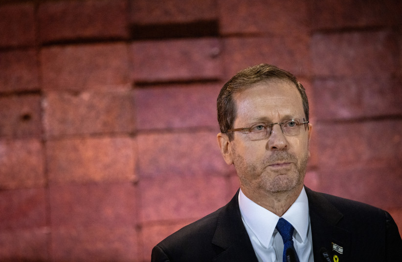  Israeli president Isaac Herzog speaks at a ceremony held at the Yad Vashem Holocaust Memorial Museum in Jerusalem, as Israel marks annual Holocaust Remembrance Day. May 5, 2024. (credit: Chaim Goldberg/Flash90)