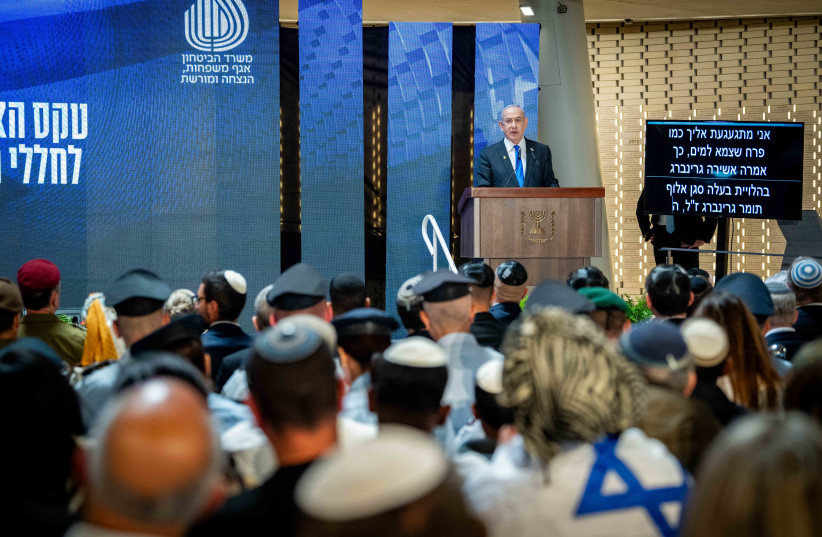  Prime Minister Benjamin Netanyahu speaks at the Remembrance Day ceremony at Mount Herzl. May 13, 2024. (credit: Arie Leib Abrams/Flash90)