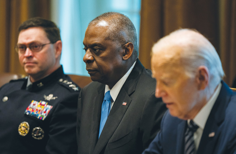  US DEFENSE Secretary Lloyd Austin listens as President Joe Biden speaks during a meeting with the Joint Chiefs of Staff and Combatant Commanders in the Cabinet Room at the White House in Washington, on Wednesday. (credit: Elizabeth Frantz/Reuters)