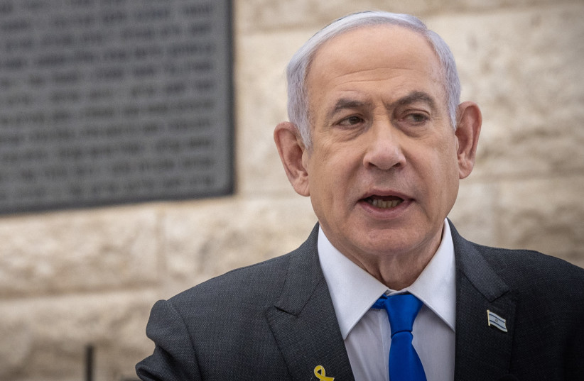  Israeli Prime Minister Benjamin Netanyahu attends a state memorial ceremony for victims of terror, at Mount Herzl military cemetery in Jerusalem, May 13, 2024. (credit: Chaim Goldberg/Flash90)