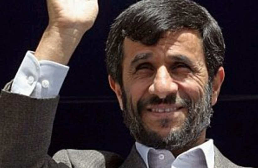 Ahmadinejad wave 298.88 (photo credit: )