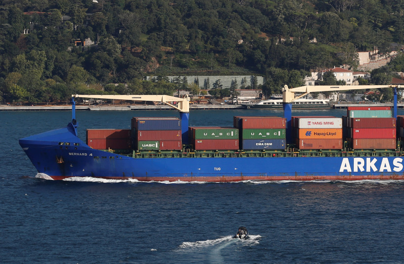  Turkish-flagged container ship Bernard A of Arkas Holding sails in the Bosphorus, on its way to the Black Sea, in Istanbul, Turkey July 24, 2018. (credit: REUTERS/MURAD SEZER)