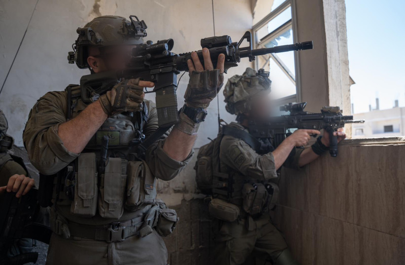 IDF soldiers operate in the Gaza Strip on May 20, 2024 (credit: IDF SPOKESPERSON'S UNIT)