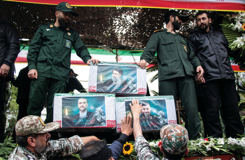  PAYING HOMAGE to Iranian president Ebrahim Raisi at a funeral ceremony in Tabriz, East Azerbaijan Province, Iran, May 21. (credit: Stringer/WANA)