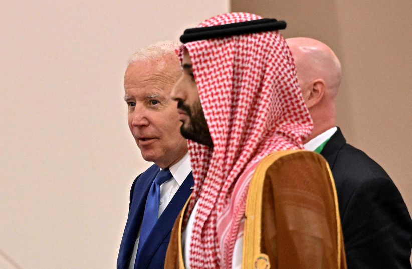  U.S. President Joe Biden and Saudi Crown Prince Mohammed bin Salman arrive for the family photo during the ''GCC+3'' (Gulf Cooperation Council) meeting at a hotel in Jeddah, Saudi Arabia July 16, 2022. (credit: Mandel Ngan/Pool via REUTERS/File Photo)