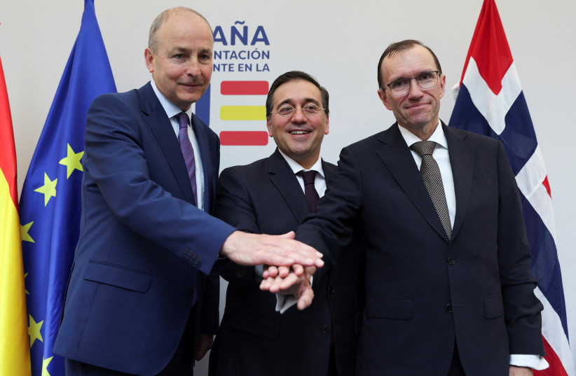 Spanish Foreign Minister Jose Manuel Albares, Norway's Foreign Minister Espen Barth Eide and Ireland's Foreign Minister Micheal Martin gesture after a press conference in Brussels, Belgium May 27, 2024.