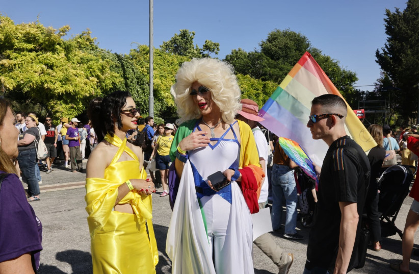 Israelis are seen taking part in the Gay Pride Parade in Jerusalem, May 30, 2024 (credit: MARC ISRAEL SELLEM)