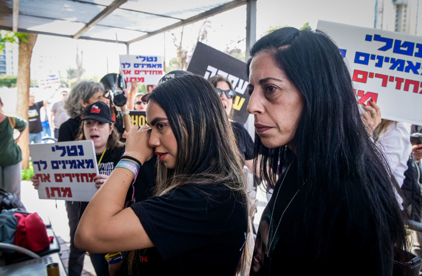  Natali Zangauker (left,) sister of Israeli hostage Matan Zangauker, and their mother Einav Zangauker arrive for a police investigation in Tel Aviv, May 1, 2024. (credit: AVSHALOM SASSONI/FLASH90)
