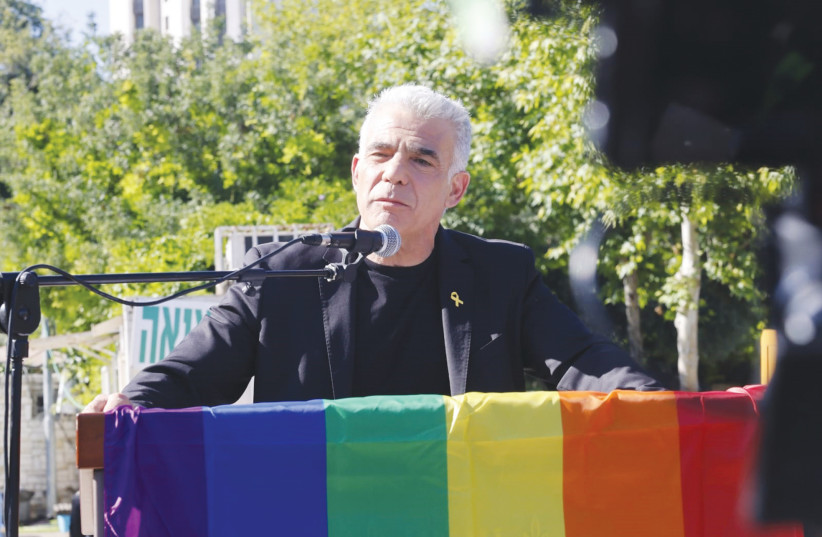  YAIR LAPID addresses participants in the Jerusalem pride parade, whose theme was ‘Born to be Free.’ (credit: MARC ISRAEL SELLEM)