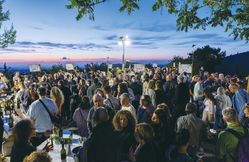  MERRYMAKERS AT the opening of the Mateh Yehuda Wine Festival. (credit: Udi Dvir )