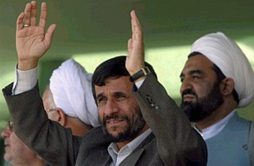 ahmadinejad hands up 298 (photo credit: AP [file])