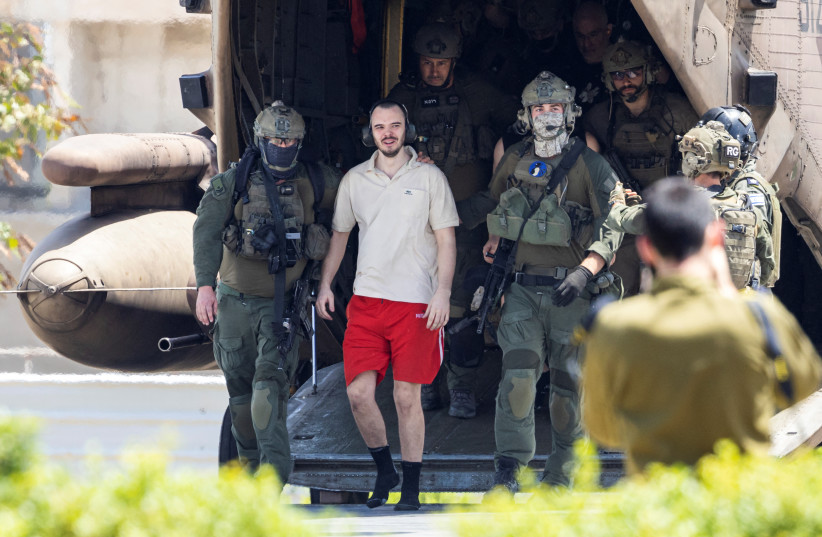  Andrey Kozlov, a released hostage is escorted, after the military said that Israeli forces have rescued four hostages alive from the central Gaza Strip on Saturday, in Ramat Gan, Israel June 8, 2024. (credit: REUTERS/MARKO DJURICA)