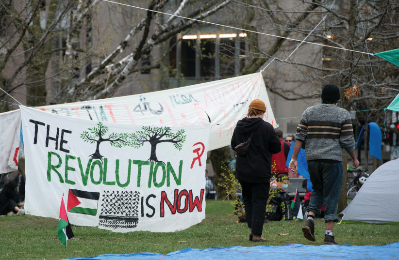  PROTESTERS GATHER at an encampment in support of Palestinians at McGill University’s campus in Montreal in April. According to the writer, too many students are harassed for being Jews; it’s an ‘inexcusable failure’ of the Trudeau government.  (credit: Peter McCabe/Reuters)