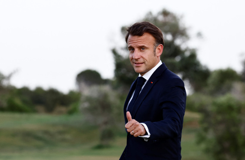  France's President Emmanuel Macron gestures on the first day of the G7 summit, in Savelletri, Italy, June 13, 2024. (credit: REUTERS/YARA NARDI)