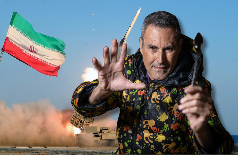 Uri Geller seen in front of an Iranian flag and a missile launch (illustrative) (credit: FLASH90, REUTERS)