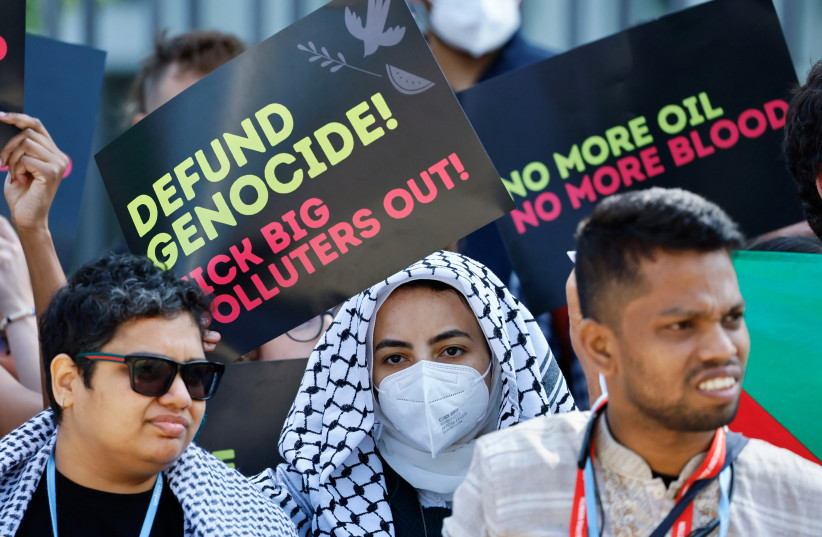 Pro Palestinian protesters demonstrate during the UN Climate Change Conference, amid the ongoing conflict between Israel and Hamas, in Bonn, Germany, June 7, 2024.