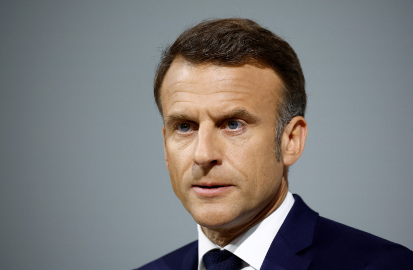 French President Emmanuel Macron speaks during a press conference about the priorities of his Renaissance party and its allies ahead of the early legislative elections in Paris, France, June 12, 2024. (credit: REUTERS/STEPHANE MAHE)