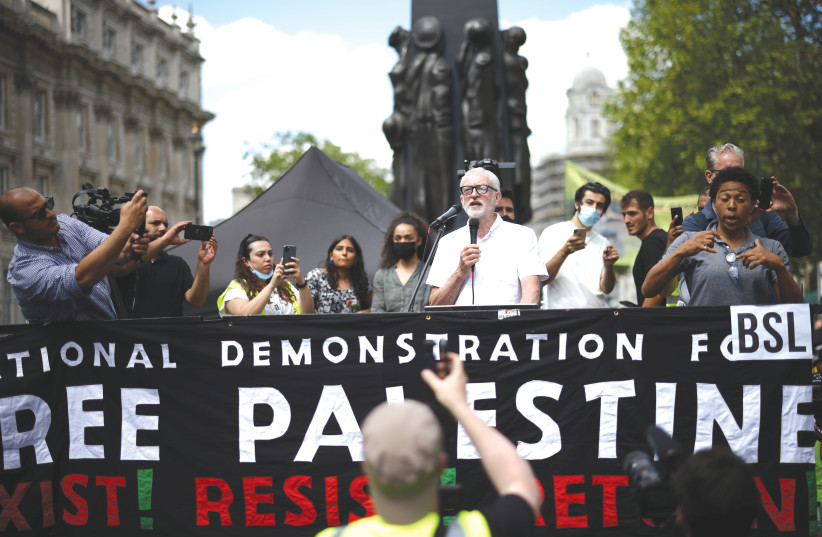  Former Labour Party leader Jeremy Corbyn was expelled from the parliamentary party over an antisemitism row last March. Here, he delivers a speech during a pro-Palestine demonstration outside Downing Street in London in June 2021. (credit: HENRY NICHOLLS/REUTERS)