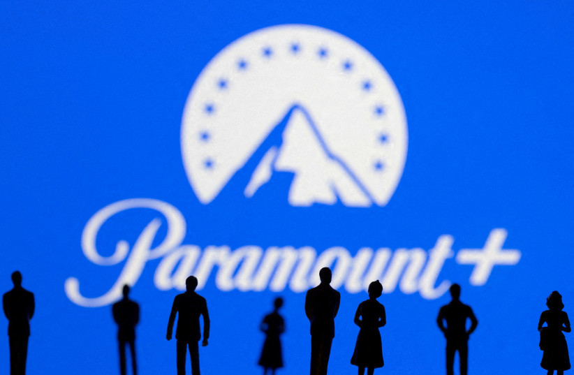  Toy figures of people are seen in front of the displayed Paramount + logo, in this illustration taken January 20, 2022. (credit: REUTERS/DADO RUVIC/ILLUSTRATION/FILE PHOTO)