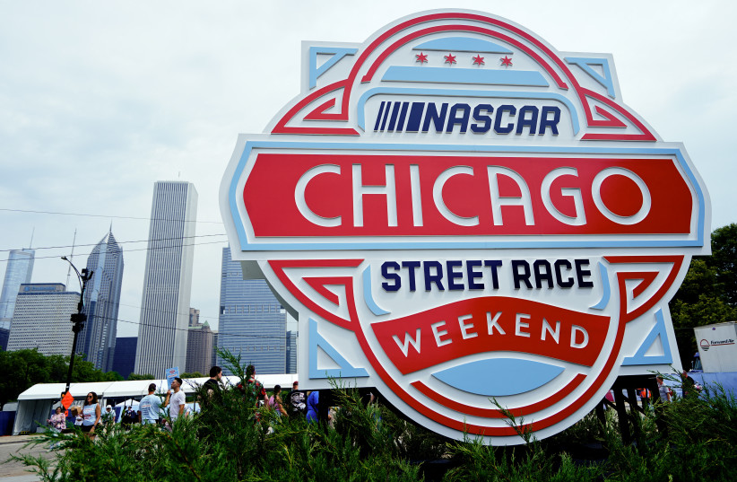A general view of a NASCAR Chicago Street Race Weekend sign at the entrance to Buckingham Fountain during practice and qualifying for the Chicago Street Race. Chicago, Illinois. July 1, 2023. (credit: Jon Durr-USA TODAY Sports)