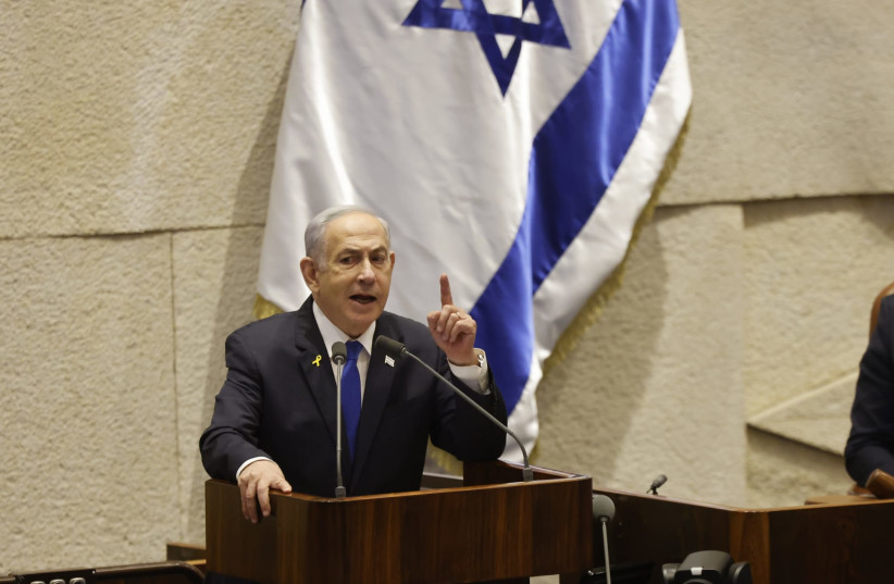  Prime Minister Benjamin Netanyahu speaks in the Knesset plenum, in Jerusalem, June 24, 2024 (credit: MARC ISRAEL SELLEM)