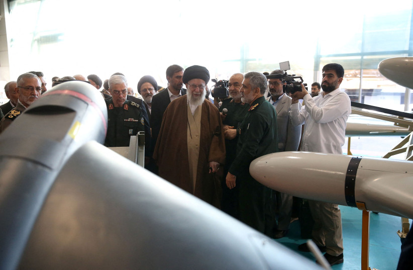  Iran's Supreme Leader, Ayatollah Ali Khamenei looks at an Iranian drone during his visit to the IRGC Aerospace Force achievements exhibition in Tehran, Iran November 19, 2023.  (credit: Office of the Iranian Supreme Leader/WANA via REUTERS)