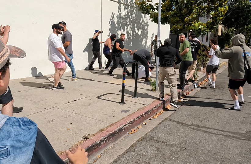  Pro-Palestinian protesters clash with counter-protesters, near Adas Torah synagogue in Pico-Robertson neighborhood, California, U.S., June 23, 2024, in this still image obtained from a video. (credit: REUTERS/SHAY HORSE)
