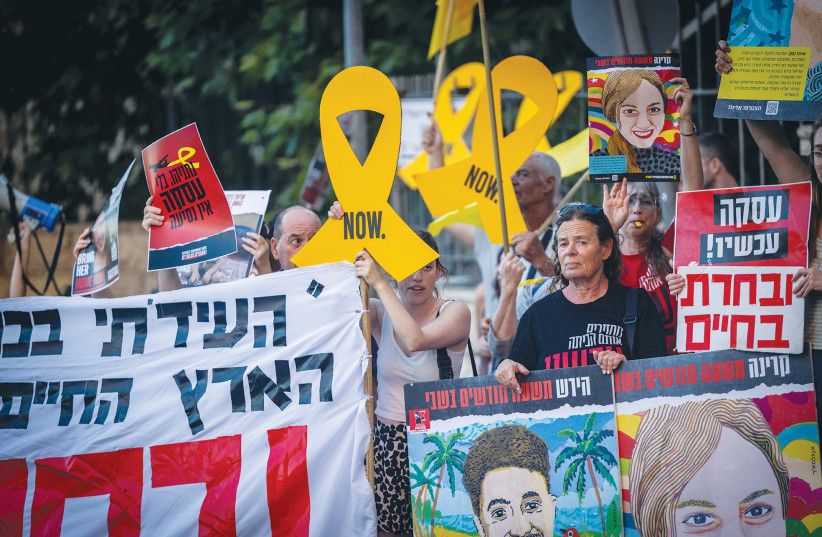 FAMILIES AND SUPPORTERS of Israeli soldiers kidnapped by Hamas from the Nahal Oz surveillance outpost on October 7 demand the release of all hostages held in Gaza, outside the home of Shas head MK Aryeh Deri in Jerusalem, earlier this week.