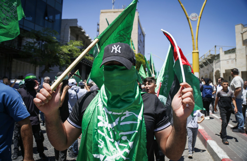 Hamas supporters take part in a protest following the killing of Hamas leader Ismail Haniyeh in Iran, in Hebron, July 31, 2024