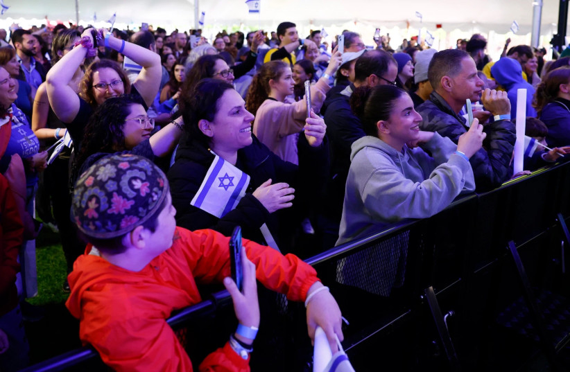 A crowd watches rapper Kosha Dillz perform during the ''We Will Dance Again'' event presented by MIT Hillel in Cambridge, Massachusetts, May 16, 2024.