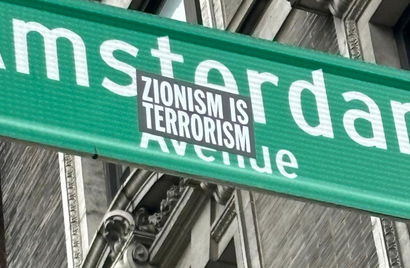 A sticker placed by an anti-Israel protester in front of a residential building across from Columbia’s Amsterdam gate, May 2024.. (Shira Dicker/The Media Line)