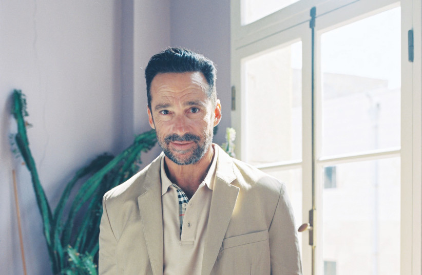 YUVAL SEGAL models a casual Givenchy outfit for Factory 54.