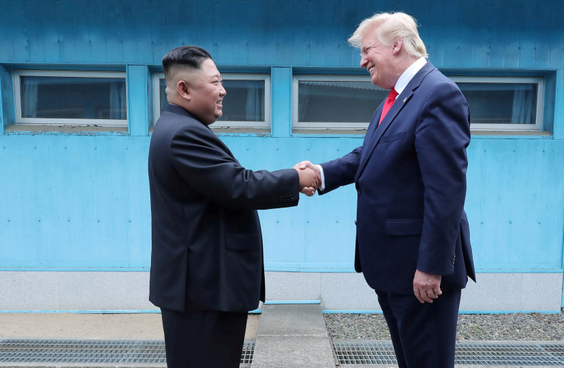 Trump shakes hands with North Korean Leader Kim Jong-un at border 9/30/2019