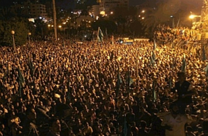 gaza rally after airstri (photo credit: AP)