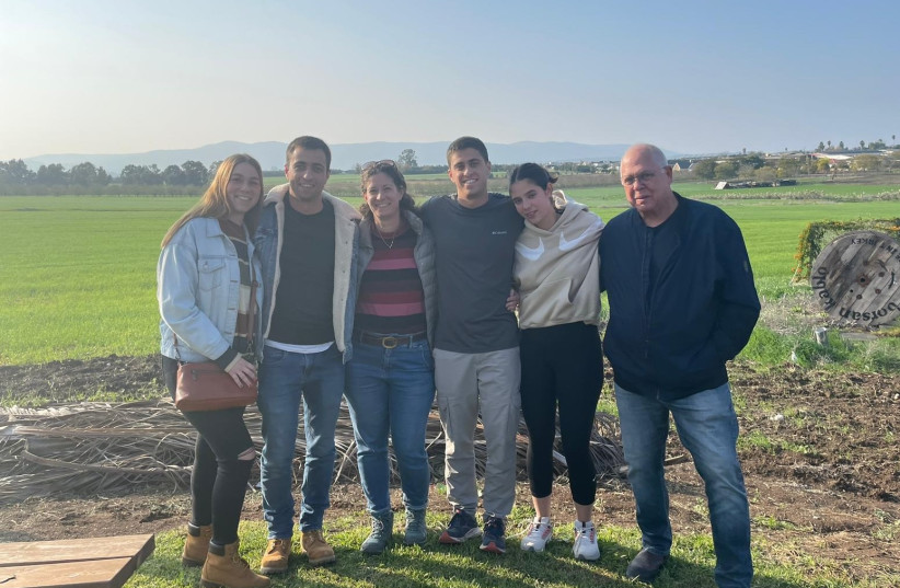 A FAMILY get-together against the background of the Jezreel Valley, 2023. From left: Yuval, Hod, his mother Hadas, brother Koren, sister Michal, and father Amir.