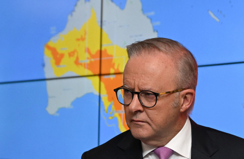 Australian Prime Minister Anthony Albanese reacts during a briefing during a visit to the Australian Government National Situation Room in Canberra, Australia, January 9, 2026.