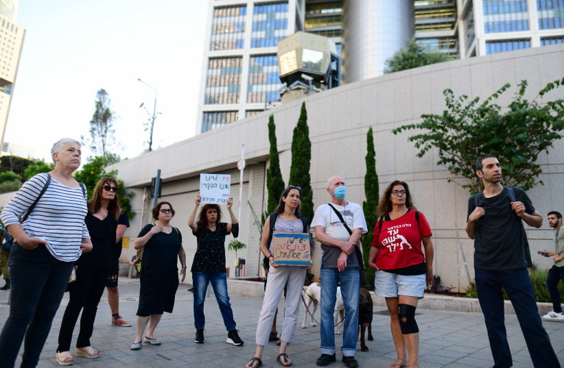 Israelis protest outside HaKirya base in Tel Aviv, calling to release information about the Military Intelligence officer who died in prison, on June 7, 2021.