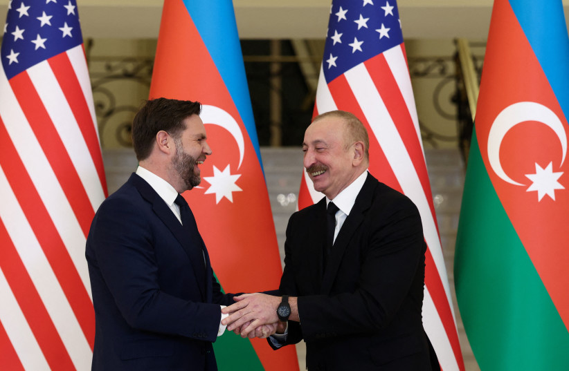 US Vice President JD Vance and Azerbaijani President Ilham Aliyev shake hands, at the Zagulba Presidential Residence in Baku, Azerbaijan, February 10, 2026.