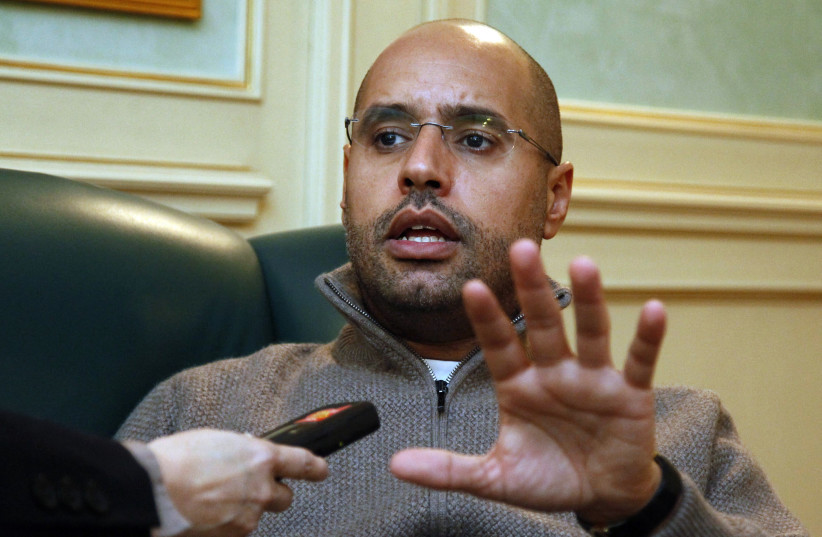 Saif al-Islam Gadhafi, son of Libyan leader Moamer Gadhafi, speaks during an interview with AFP in Tripoli on February 26, 2011.
