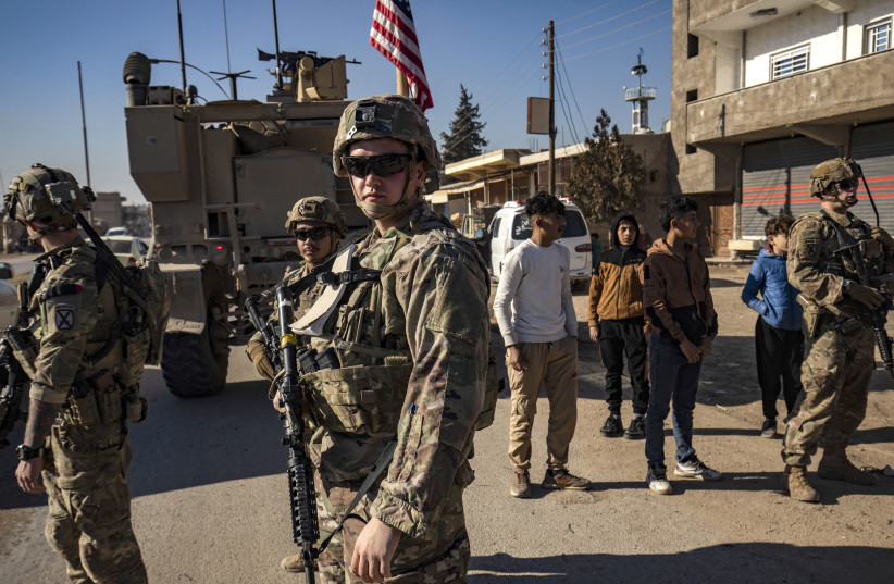 US forces patrol in Syria's northeastern city Qamishli, in the Hasakeh province, mostly controlled by Kurdish-led Syrian Democratic Forces (SDF), on January 9, 2025.