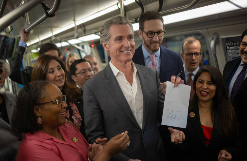 CALIFORNIA GOVERNOR Gavin Newsom participates in a signing event to authorize a $590 million emergency loan for Bay Area transit agencies, including BART, to prevent major service cuts, such as station closures and reduced hours in San Francisco, California, US, February 19, 2026.